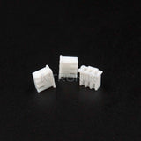 3 Pin JST Xh Female Connector 2.54mm Pitch - three small white plastic connector housings arranged on a black surface.