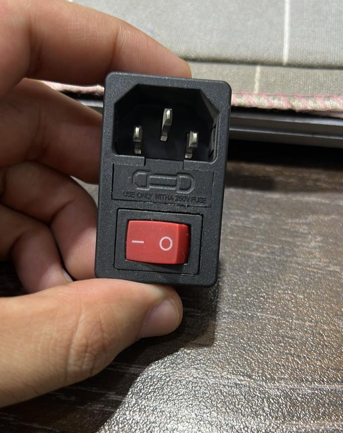 3-pin Male AC Power Inlet Socket With Indicator - close-up of the black plastic rectangular module featuring a red rocker switch and a fuse compartment.