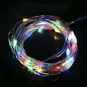 30 Pcs Colorful LED Line With AA Cell Holder - shown as a coiled strand of thin wire featuring multiple small, glowing multi-colored LED lights.