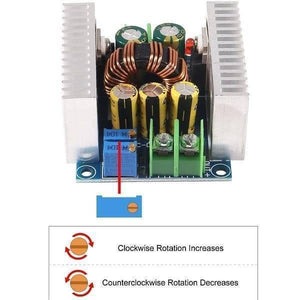 300W 20A Adjustable DC-DC Step Down Buck Converter Voltage Regulator Power Supply Module - a blue circuit board with two heatsinks, capacitors, a coil, and a diagram of adjustment knobs.