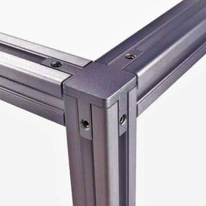 3030 Size 3 Way End Corner Bracket Connector For t Slot Aluminum Extrusion Profile 3030 - a close-up of a grey metal corner piece connecting three lengths of t-slot aluminum extrusion profiles.