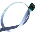 30cm Raspberry Pi Ffc Camera Cable - a white flat ribbon cable attached to a small green circuit board with a black camera sensor.