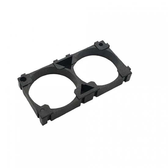 32140 Lithium Cell Holder Bracket - Dual Cell Spacer - a black plastic rectangular frame with two circular openings for housing batteries.