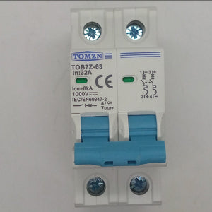 32A Tomzn Tob7z-63 2p DC 1000V Solar Circuit Breaker - Reliable Protection For Solar System - a white two-pole electrical switch with blue toggles, screw terminals, and printed technical specifications.
