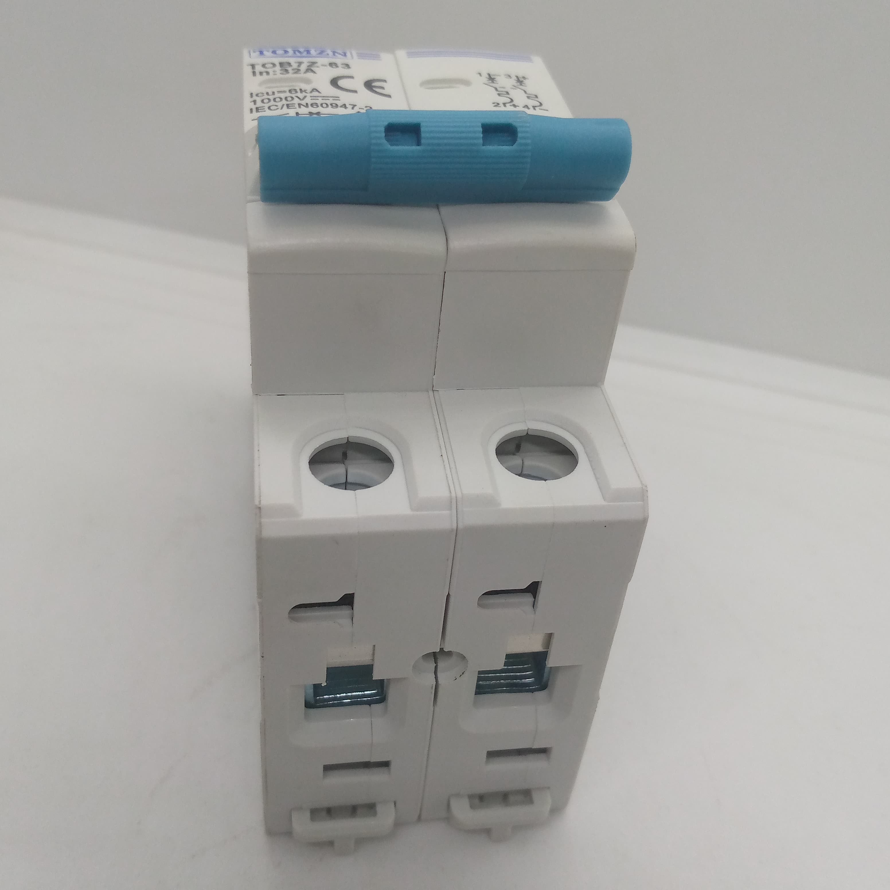 32A Tomzn Tob7z-63 2p DC 1000V Solar Circuit Breaker - Reliable Protection For Solar System - a white two-pole electrical switch with a blue toggle lever and visible terminal ports.