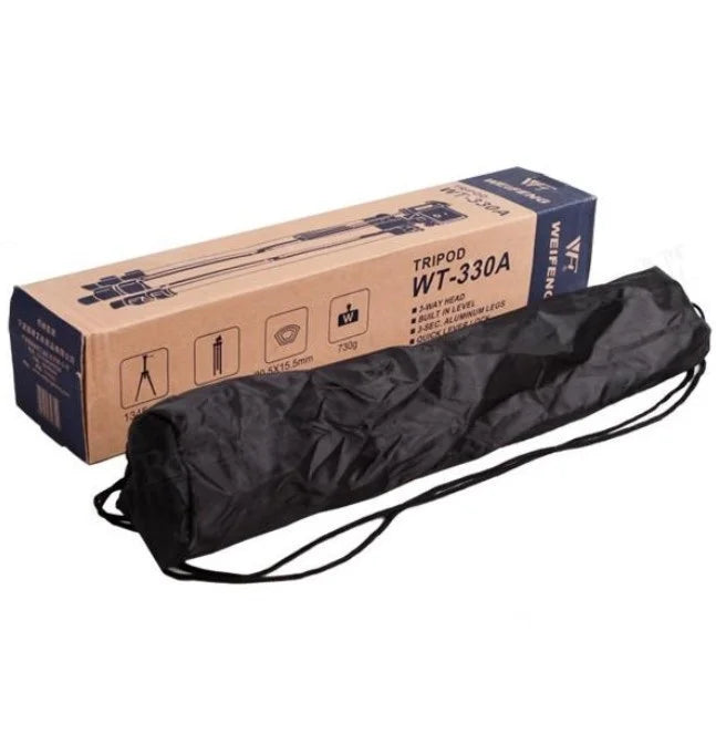 330A Tripod Mobile + Camera Stand Professional Stand For Tik Tokers & Youtubers - shown as a brown cardboard retail box with a black carrying bag placed in front.