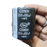 350V 680uF Capacitor - a black cylindrical electrolytic capacitor held in a hand with the specifications printed in white text.