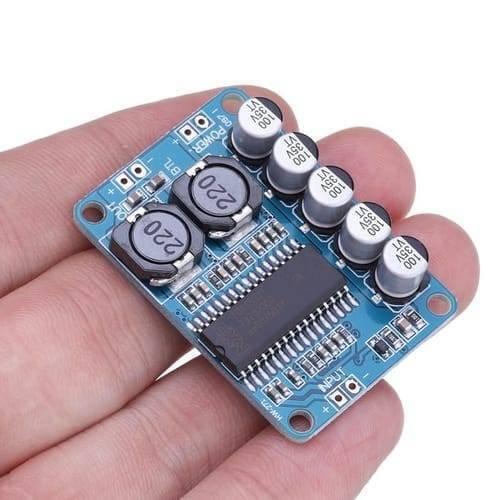 35W Digital Amplifier Board TDA8932 Mono Audio Power Amplifier Module Low Power Consumption - a blue rectangular circuit board with a central chip, two inductors, five capacitors, and input/output ports.