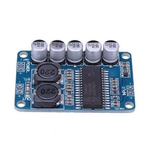 35W Digital Amplifier Board TDA8932 Mono Audio Power Amplifier Module Low Power Consumption - a blue rectangular circuit board with five capacitors, two inductors, and input/output power terminals.