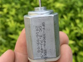 390PA DC Motor - shown in a close-up, featuring a silver cylindrical metal casing with printed text including "SFF-390PA-3558V" and "DC 3.7V".