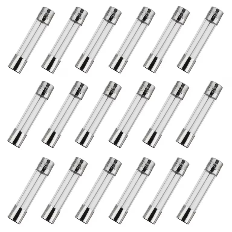 3A 250V Glass Fuse 6X30mm - shown as a collection of eighteen identical cylindrical glass fuses with metal end caps arranged in three rows.