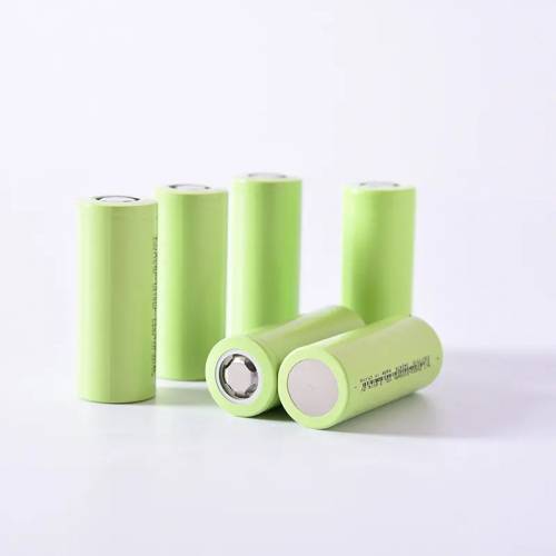 3c Discharge Hly Ncm 26650 5Ah 5000mAh Lithium Ion Battery Cell For E-bike Battery Pack - a group of six light green cylindrical batteries arranged upright and lying down.