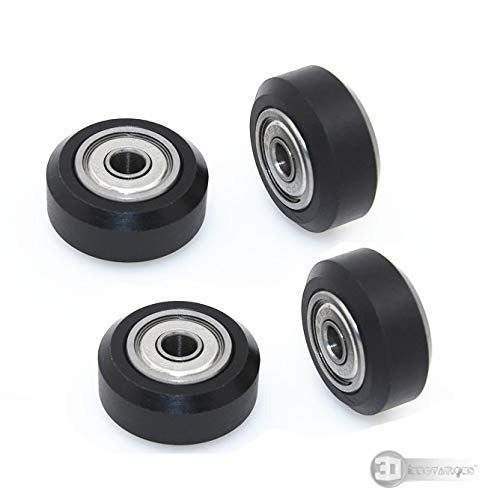 3dinnovations Openbuilds Pom Plastic Wheel Mini V With 105ZZ Bearing - four black V-slot wheels with silver metal ball bearings arranged on white.