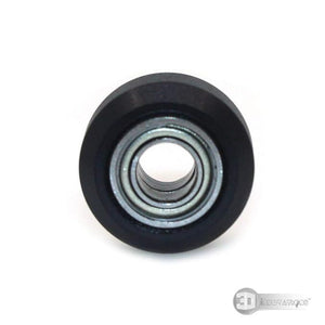 3dinnovations Openbuilds Pom Plastic Wheel Mini V With 105ZZ Bearing - shown as a close-up of the black circular wheel with a central metal bearing.