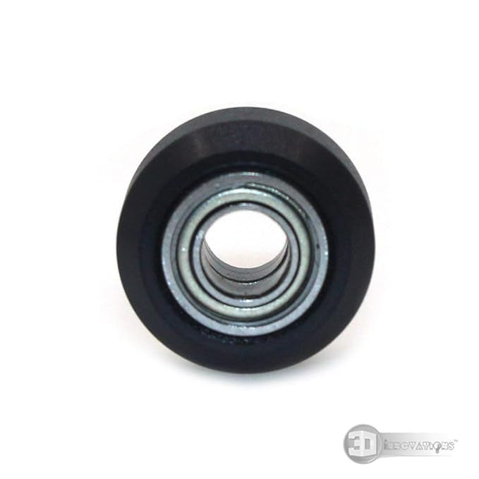 3dinnovations Openbuilds Pom Plastic Wheel Mini V With 105ZZ Bearing - shown as a close-up of the black circular wheel with a central metal bearing.