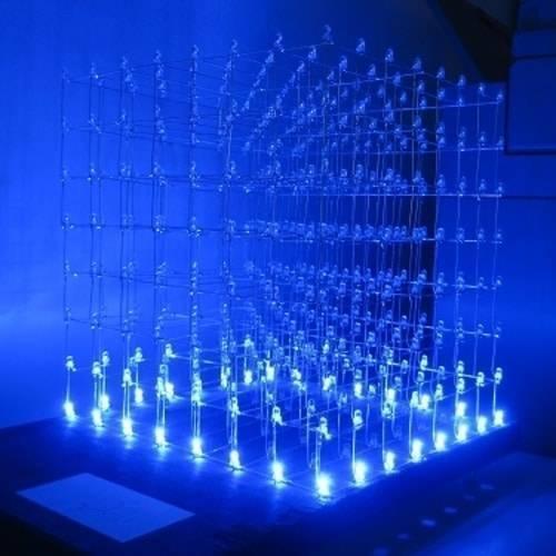 3mm Blue LED Super Bright - arranged in a glowing 3D cube structure with multiple blue light-emitting diodes connected by a wire grid.
