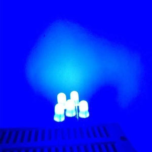 3mm Blue LED Super Bright - shown as a small cluster of five illuminated blue light-emitting diodes mounted on a breadboard.