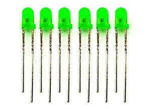 3mm Green LED - a row of six small green light-emitting diodes with two metal pins each on a white background.