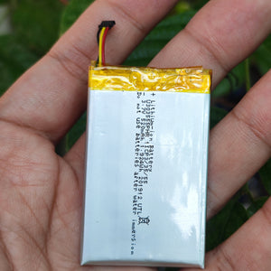 3mm x 35mm x 55mm 3.7V 500mAh Lithium Polymer Rechargeable Battery - a rectangular silver battery with a yellow taped top and a small three-wire connector held in a hand.