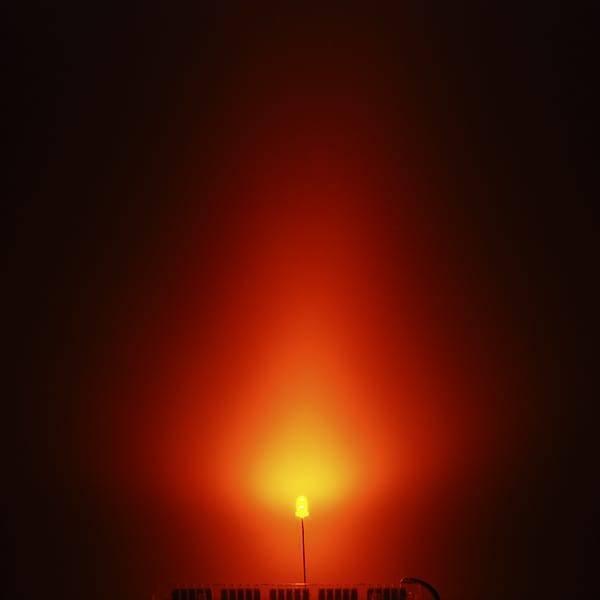 3mm Yellow Diffused LED Diode Lighting Bulb Lamp - with a bright yellow light against a dark background.