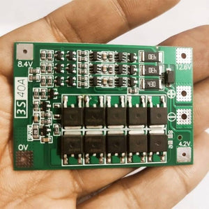 3s 40A BMS 11.1V 12.6V 18650 Lithium Battery Protection Board With 100mA Balancing Feature - a rectangular green circuit board with ten MOSFETs, resistors, and labeled connection pads for 0V to 12.6V.