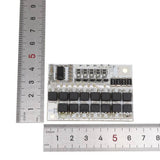 3s/4s/5s BMS 12V 16.8V 18V 3.2V 100A BMS For LiFePO4 Lithium Iron Phosphate Lithium Battery Protection Circuit Board Li-polymer Balance Charging - a white rectangular circuit board with electronic components, shown next to two metal rulers for scale.