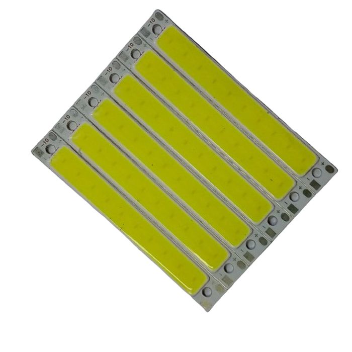 3W 3.7V 1000mA 300LM LED COB Light Module For Bike DIY Work Lamp Buy - a rectangular circuit board with five parallel yellow LED strips and silver contact pads on the ends.