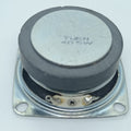 4 Ohm 5 Watt Speaker - the back of the square metal frame with a circular black magnet and two soldered terminal connection points.
