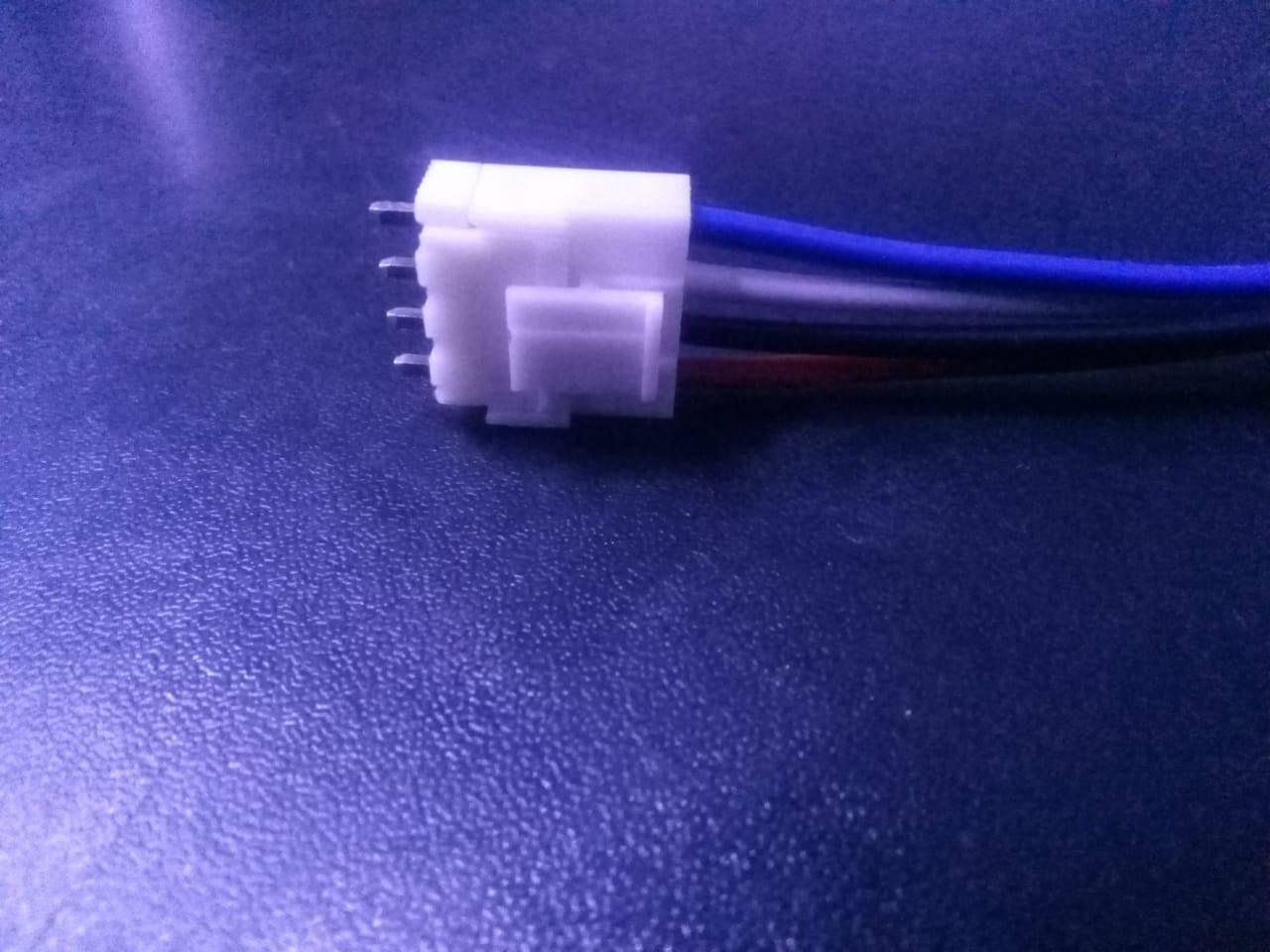4 Pin RGB Panel Connector Fan Connection Pair With Male Header - a close-up of a white four-pin connector with blue, white, black, and red wires.