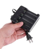 4 Slot 18650 Li-ion Battery 4.2V Four Slot Lithium Ion Batteries Smart Charger - a black plastic four-slot charging unit with an attached power cord and plug.