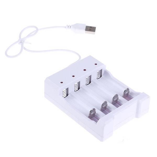 4 Slot USB Universal Battery Charger Fast Charging Adapter For Ni-MH Not For 18650 - a white, four-bay charging unit with a USB cable and four red LED status indicators.