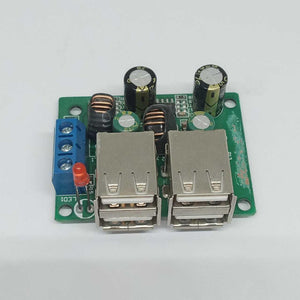 4 USB Port A5268 Chip Step Down Transformer Converter Board Module DC 12V 24V 40V To 5V 5A 25W For MP3/MP4 Phone Car Equipment - a green circuit board with four USB ports, two inductors, capacitors, and a blue terminal block.
