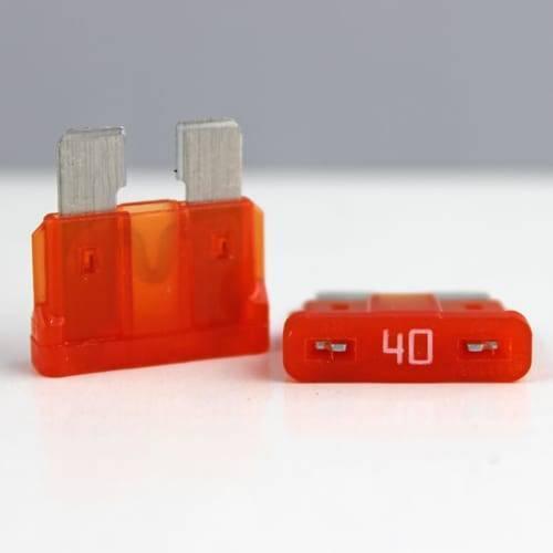 40 Amp Plug In Automotive Auto Fuse Car Fuse - two orange plastic blade-style fuses, one standing upright and one lying flat with the number 40 visible.