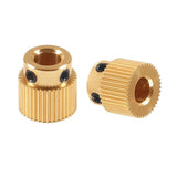 40 Tooth Gear Brass Extruder Wheel Gear for Printer Cr-10 CR-10S S4 S5 Ender 3 Pro - shown as two brass, cylindrical, toothed gears with two small black set screws on each.