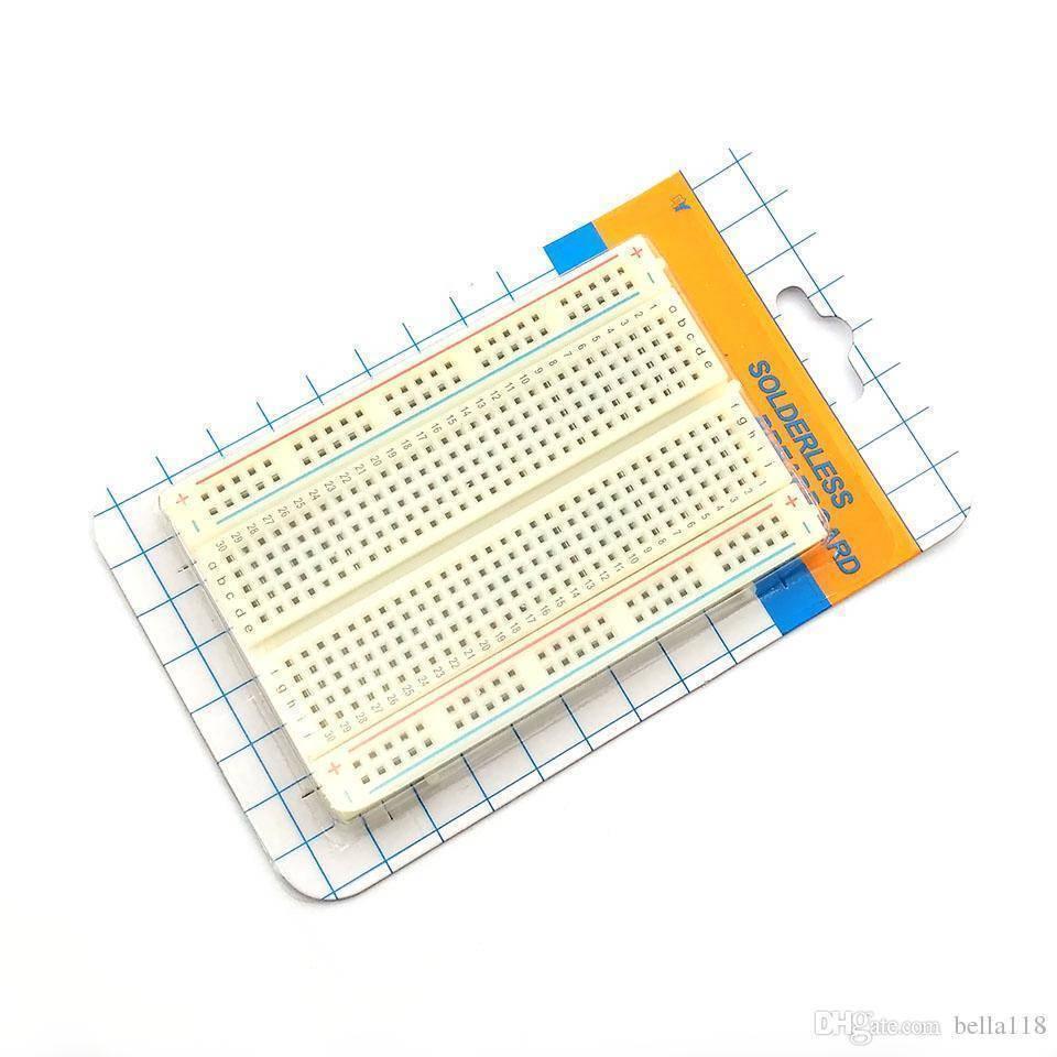 400 Tie Points Half Size Solderless Breadboard Solder Less Breadboard Prototyping Board - a white rectangular prototyping board with numbered rows and lettered columns, shown in its retail packaging.