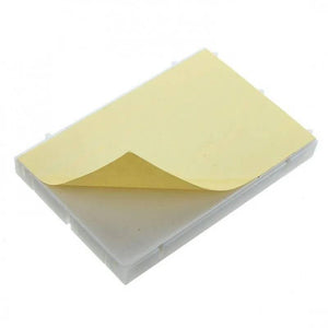 400 Tie Points Half Size Solderless Breadboard Solder Less Breadboard Prototyping Board - a white rectangular prototyping board with a partially peeled yellow adhesive backing.