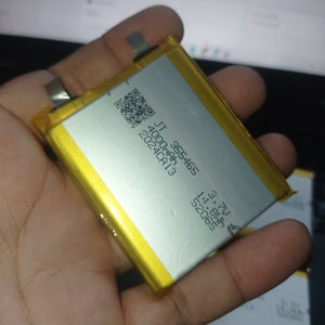 4000mAh 3.7V Lithium Ion Battery Price 9.5mm X 54mm X 65mm - a rectangular silver cell with yellow tape edges and two metal contact tabs, held in a hand.