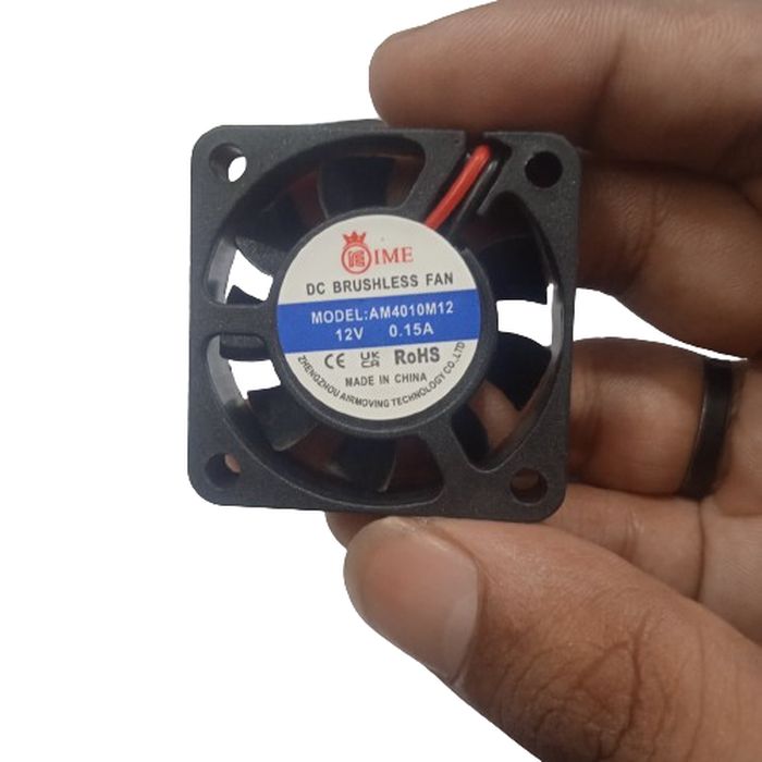 40mm X 40mm X 10mm 4010 12V 0.15A DC Brushless Ball Bearing Cooling Fan 2pin - the black square frame, fan blades, and a label with model AM4010M12 and specifications.