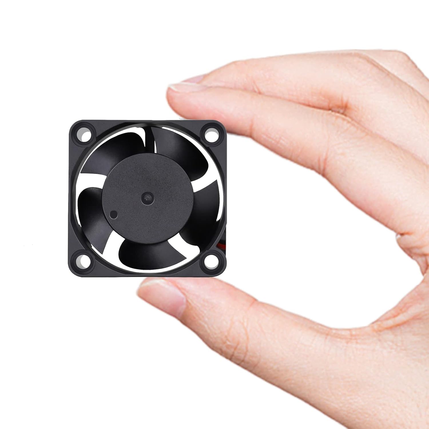 40mm X 40mm X 20mm 24V DC Brushless Small Mini Axial Cooling Fan 3d Printer Fan - held between fingers, showing a black square frame with a circular fan.
