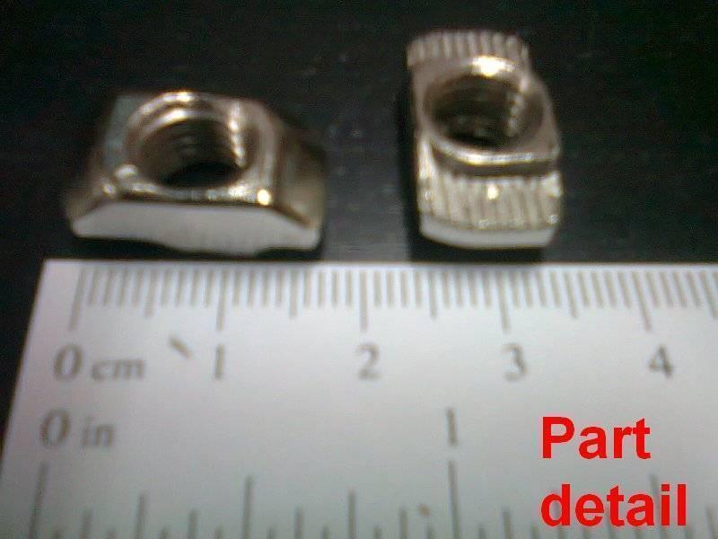 40XM8 T Nut Sliding T Nut Hammer Drop In Nut Fasten Connector M8 Series - shown as a close-up of two silver metal nuts next to a metric ruler.