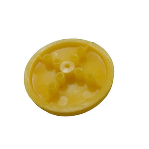 410 Wheel Tt Motor Arduino Smart Car Tyre Wheel Robot Tyre For Tt Motor - a close-up view of the yellow plastic wheel showing the inner mounting hub and central axle hole.