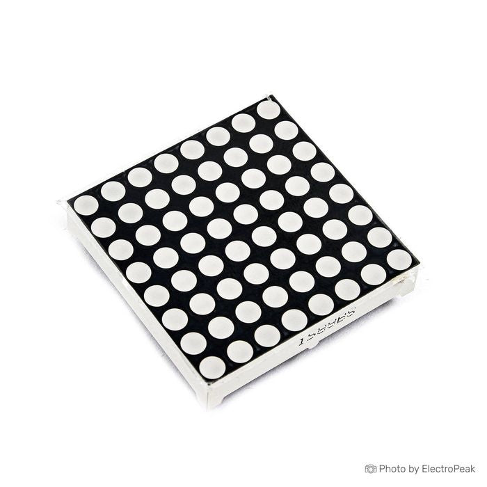 42MMX42MM 8x8 red dot matrix - a square electronic component featuring an 8x8 grid of circular white light-emitting diodes on a black surface.