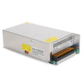 48V 15A Industrial Switching DC Power Supply - a silver metal rectangular unit with a voltage selector switch, terminal block, and adjustment knob.