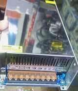 48V 20A 1000W Universal Regulated Switching Power Supply - the metal casing, AC input terminals, DC output terminals, and voltage adjustment knob.