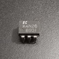 4N26 Phototransistor Optocoupler DIP-6 USED - a close-up of a black 6-pin integrated circuit component with "K4N26 8931" printed on its top surface.