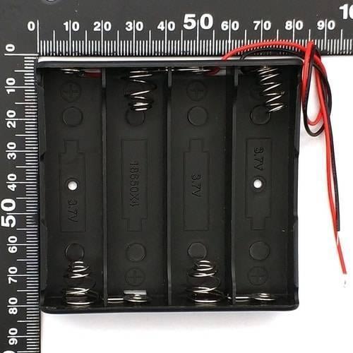 4x 18650 Battery Cell Holder Storage Box Case - shown from a top-down view with a ruler for scale, featuring four black slots and red and black wires.