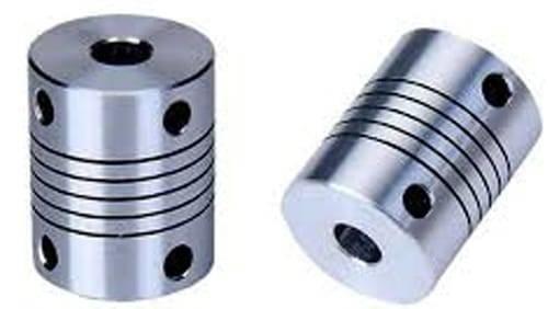 4x6.35mm Flexible Coupling Shaft - shown as two silver-coloured cylindrical metal connectors with spiral grooves and side-mounted set screw holes.