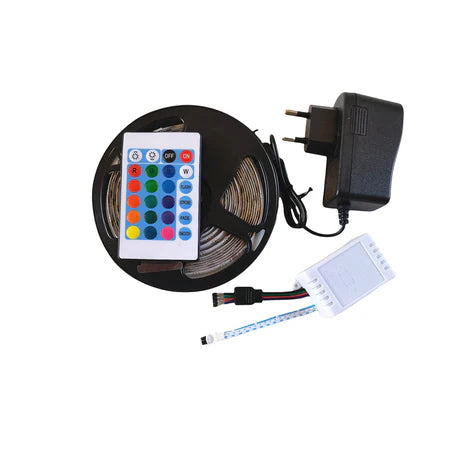 5 Meter 12V RGB LED Light Strip Set - a coiled LED strip, a remote control with color buttons, a white controller box, and a black power adapter.
