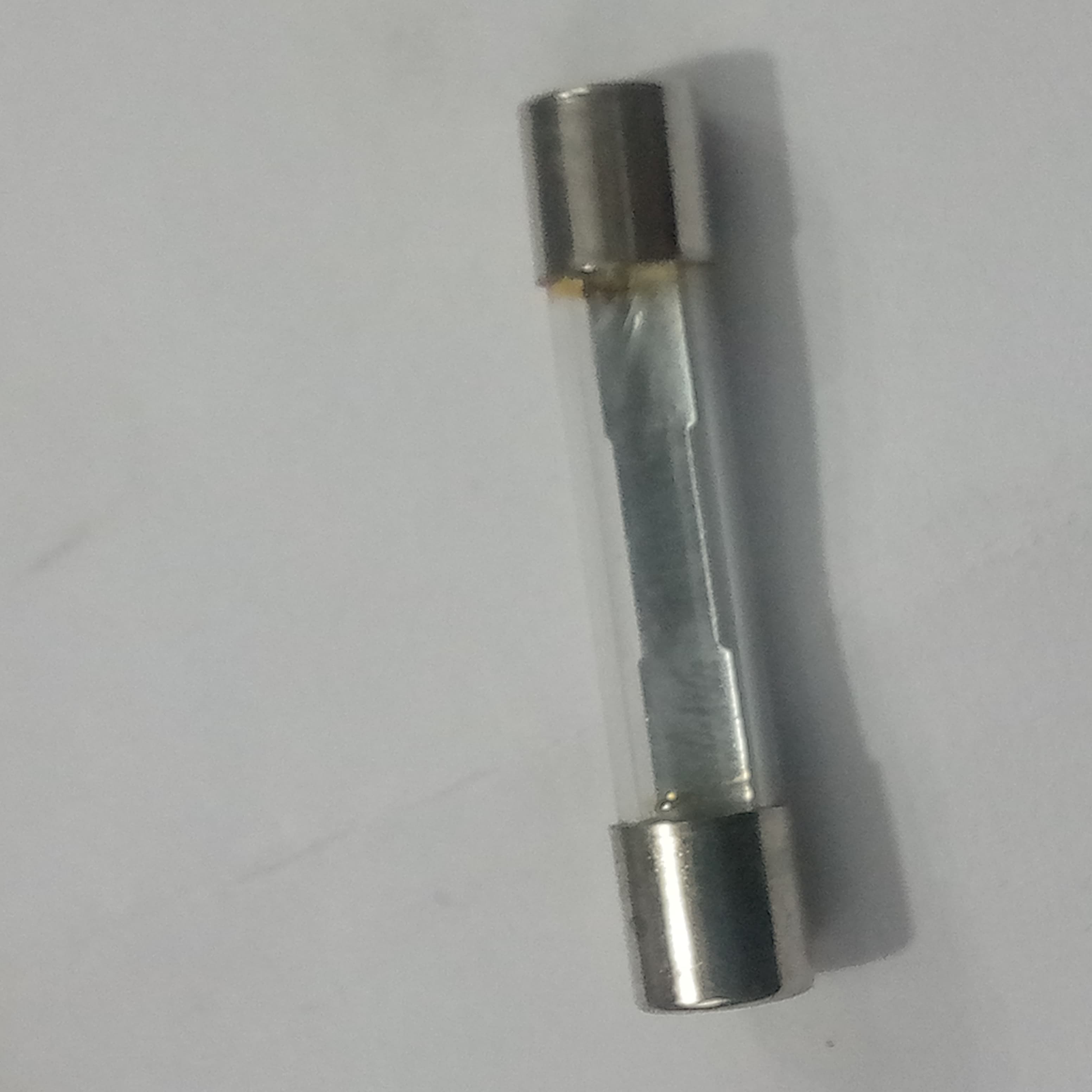 5 Pcs 6MMX21MM 35A Fuse - a single glass cartridge fuse with metal end caps and a visible internal metal element against a white background.