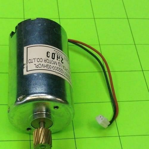 5 To 26V DC Motor Lot - a cylindrical silver DC motor with a brass gear on the shaft and a two-pin connector attached by red and black wires.